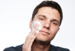 Apply ClearSynergy foam to face of thoughtful man